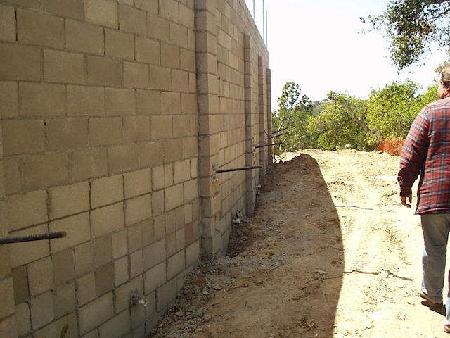 Design and Inspection of New Retaining Wall with CMU and Helical Screw Tiebacks