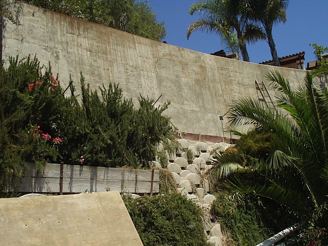 New Retaining Wall with Gewi Piles and Dywidag Tiebacks before vegetation growth